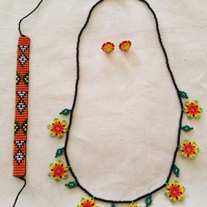 Bracelet, earrings, and necklaces